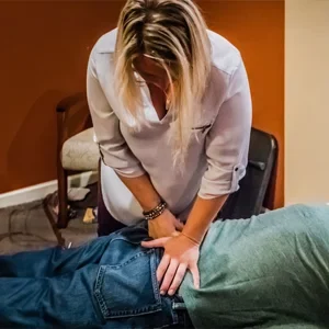 Chiropractor Perkasie PA Leah Garlan Adjusting Patient HP CIRCLE